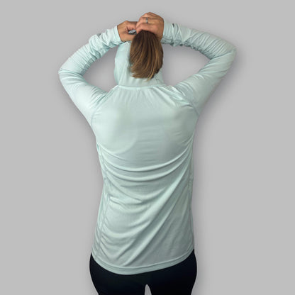 Women's Soltera Hoody in glacial green, back view with arms raised