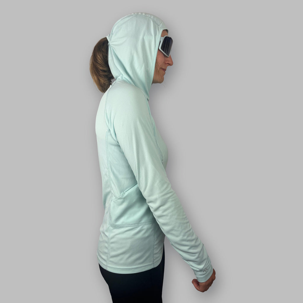 Women's Soltera Hoody in glacial green, side view with the hood up