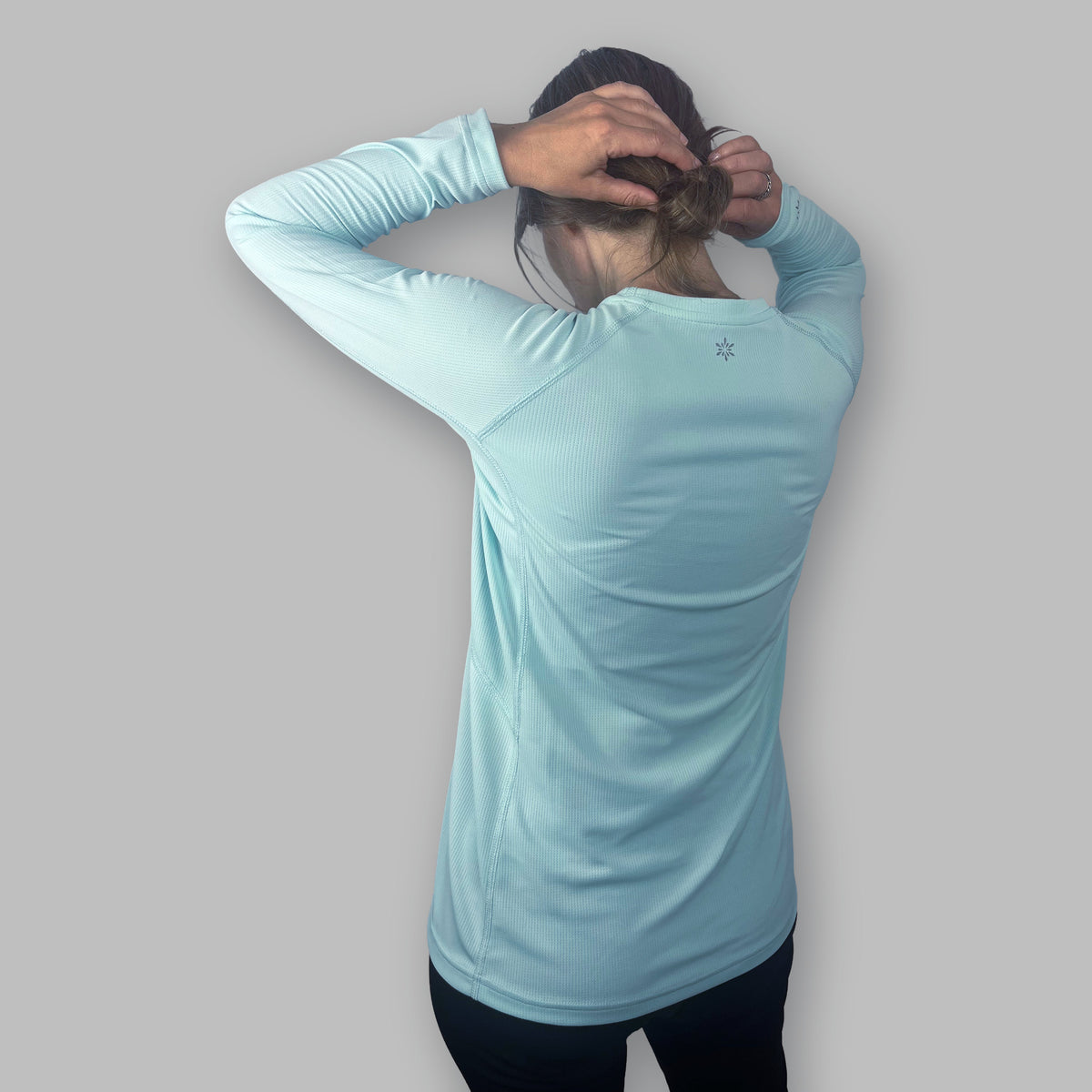 Women's Soltera Long Sleeve Crew in glacial green, back view