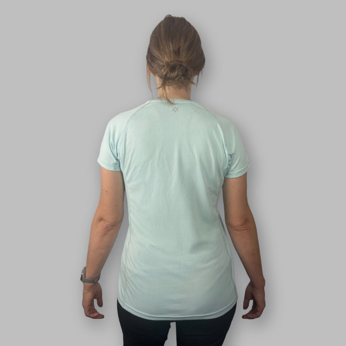 Women's Soltera Tee in glacial green, back view